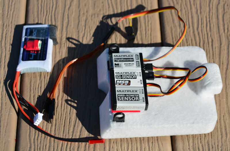 telemetry sensors under a biplane's battery compartment hatch